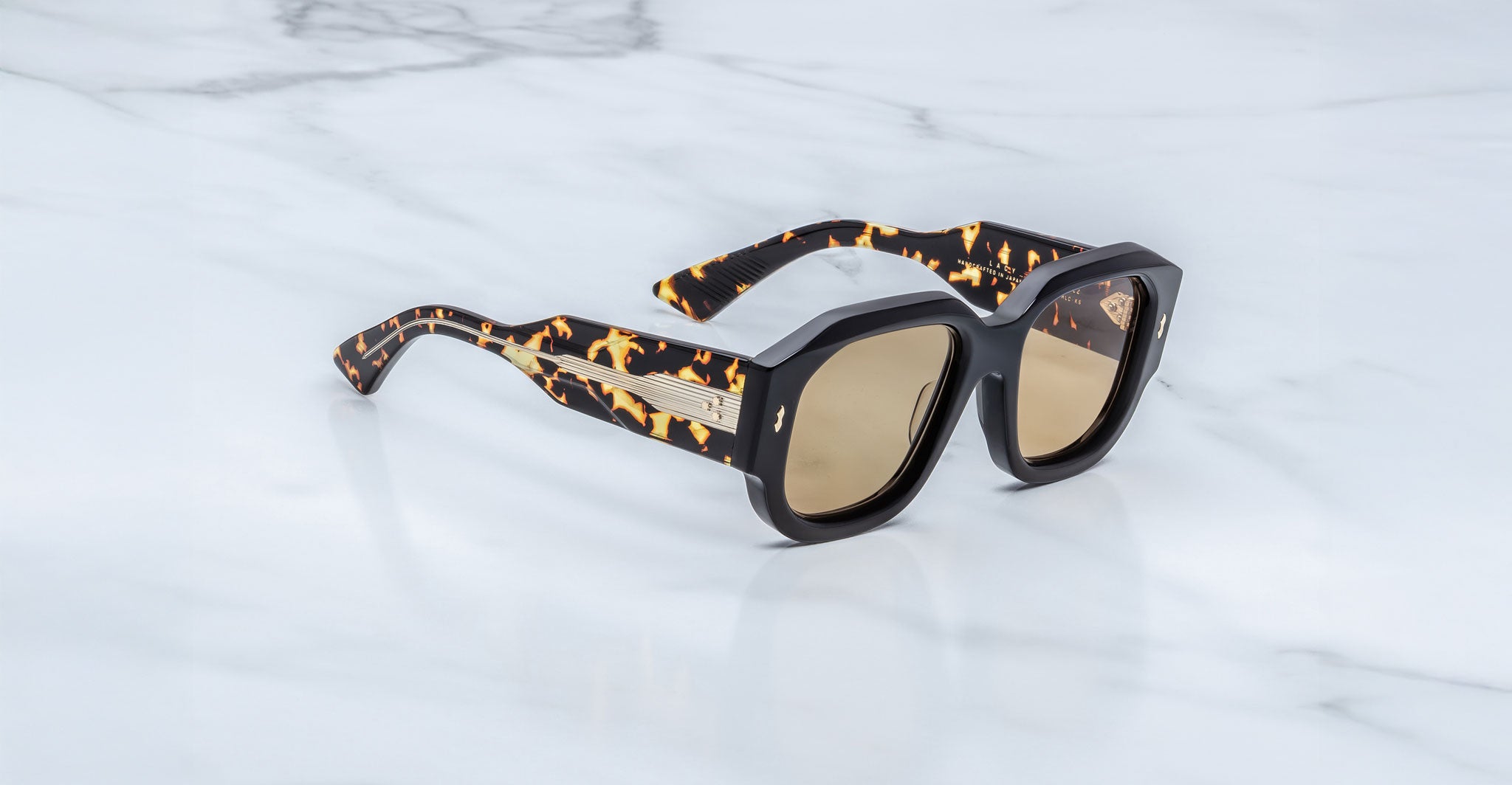 Jacques Marie Mage Lacy sunglasses, thick tortoiseshell frames, gold accents, front view.