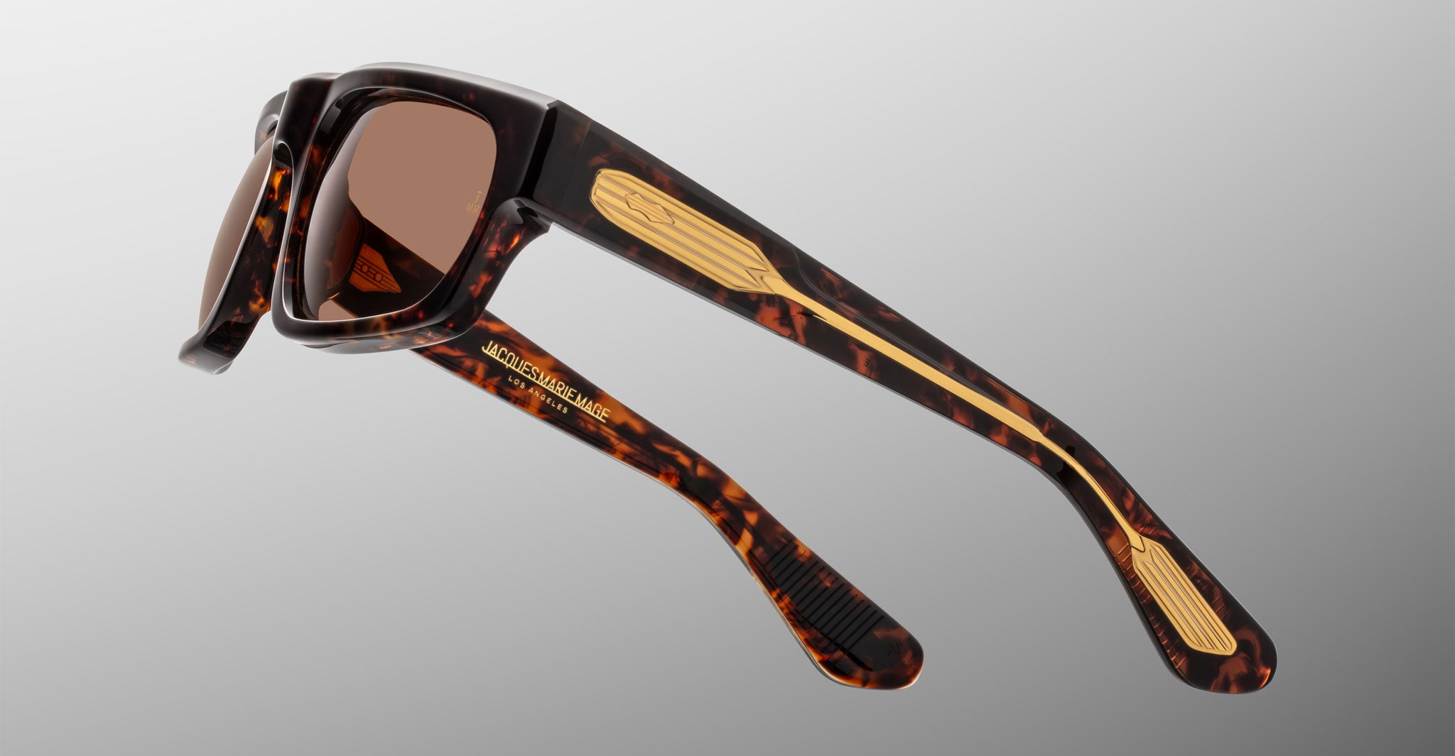 Jacques Marie Mage Louisville sunglasses, brown lenses, gold-accented arms, side angle view.