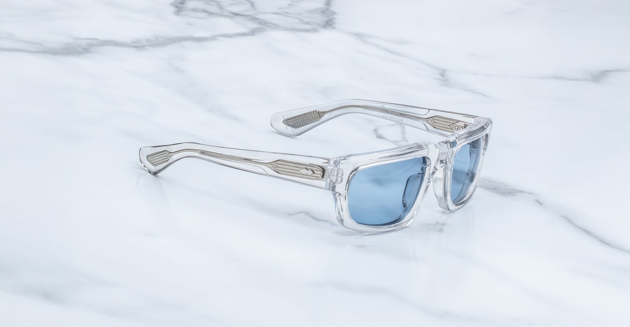 Jacques Marie Mage Louisville sunglasses with blue lenses, front view, showing thick frames and distinct lens color.
