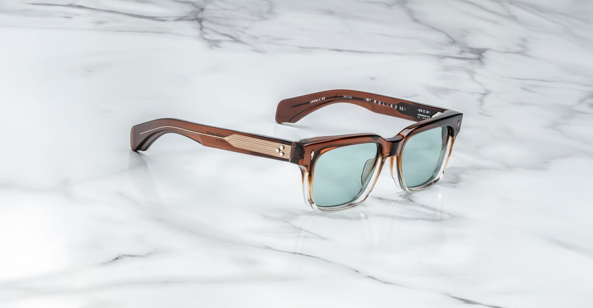 Jacques Marie Mage Molino 55 sunglasses with green polarized lenses, top view.