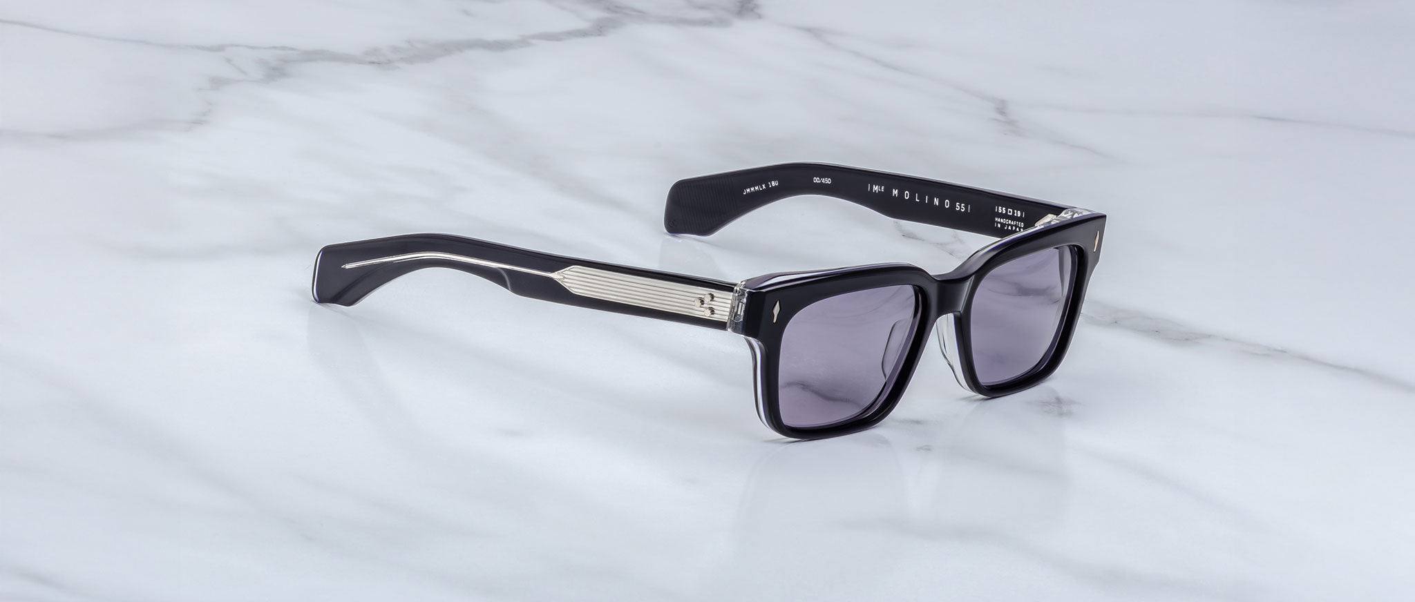 Jacques Marie Mage Molino 55 black rectangular sunglasses with dark lenses and metallic accents, front view.