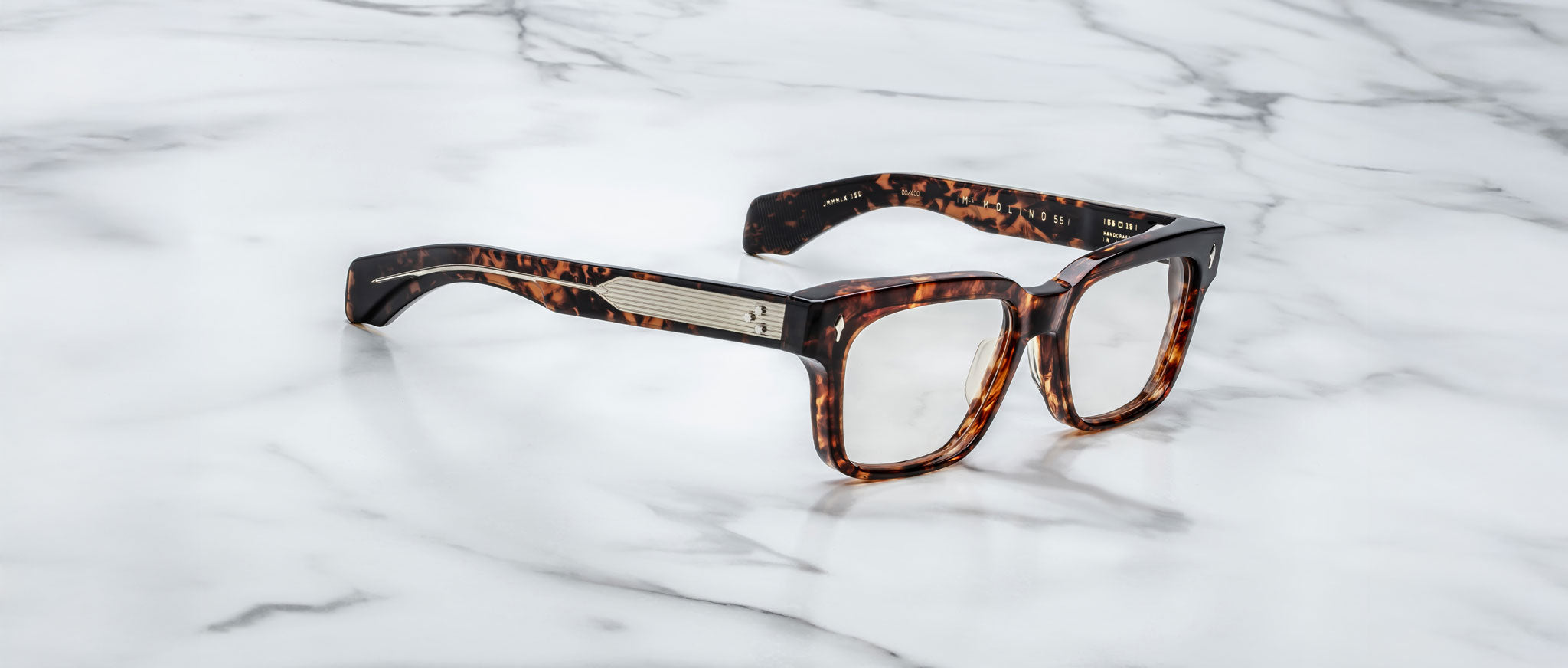 Jacques Marie Mage Molino 55 tortoiseshell rectangular eyeglasses with silver accents, shown from above.