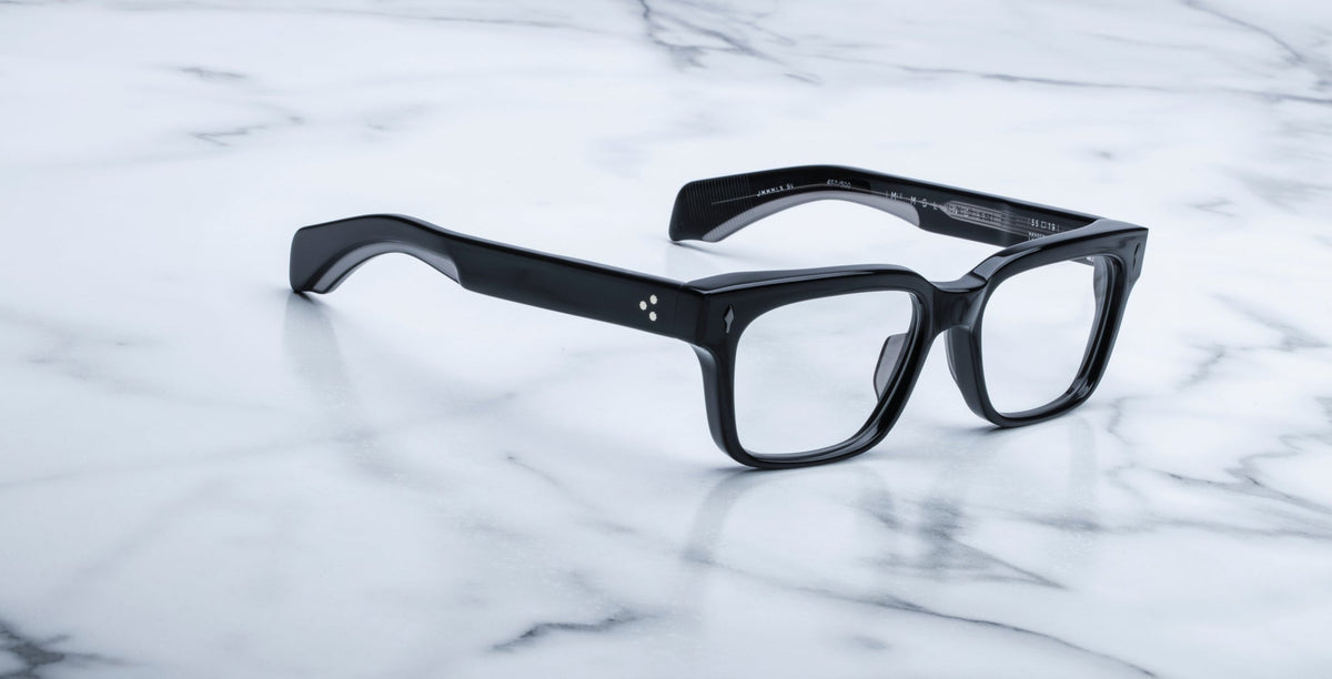 Jacques Marie Mage Molino 55 black rectangular eyeglasses with thick frames, top-down view.