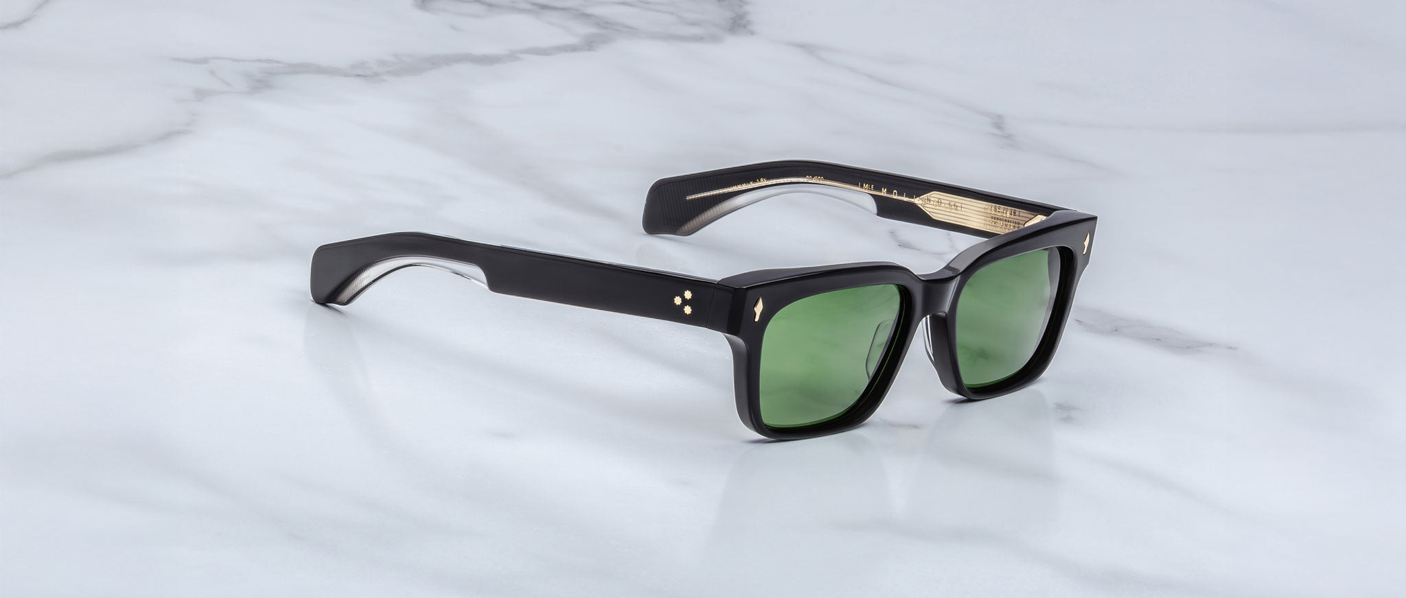 Jacques Marie Mage Molino 55 black rectangular sunglasses with green lenses, front view.