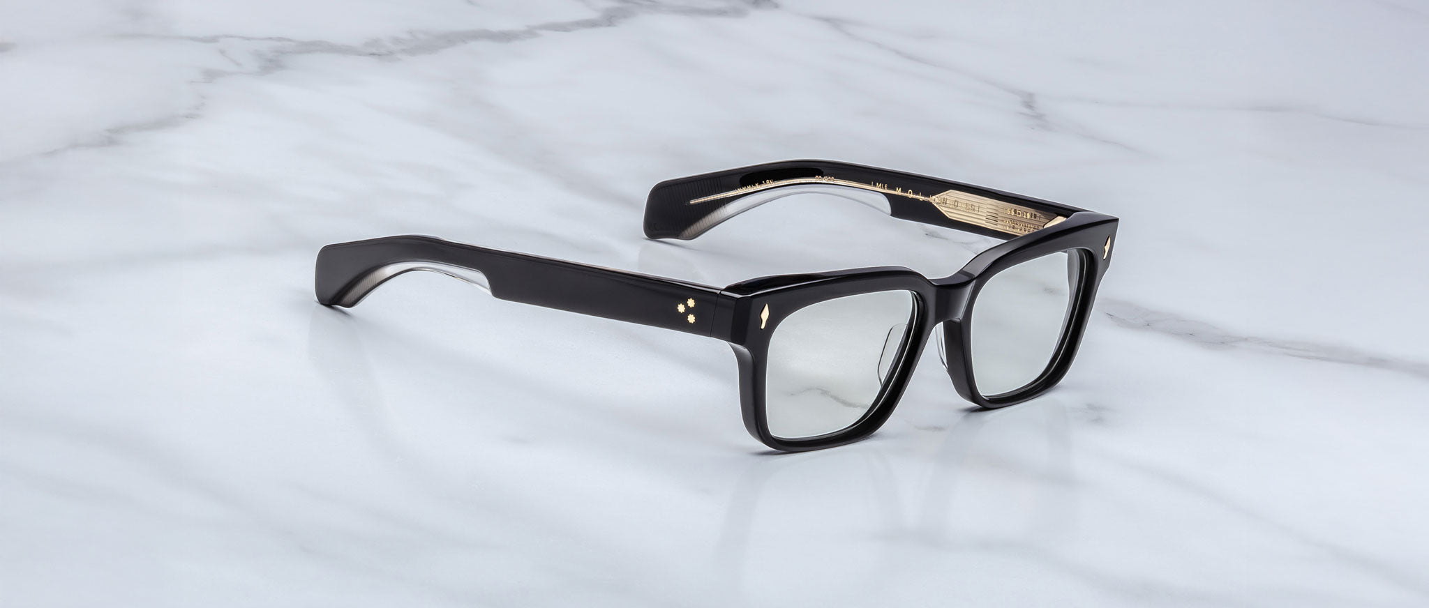 Jacques Marie Mage Molino 55 black rectangular eyeglasses with clear lenses, top view.