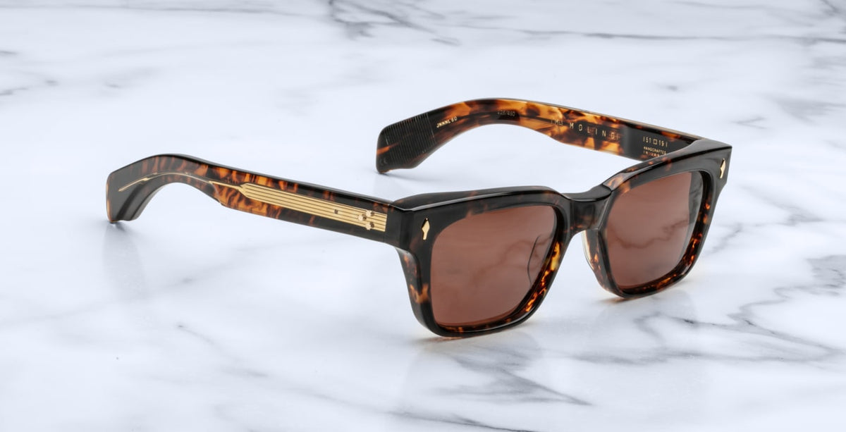 Jacques Marie Mage Molino tortoiseshell square sunglasses with UV-protection brown lenses, viewed from above.