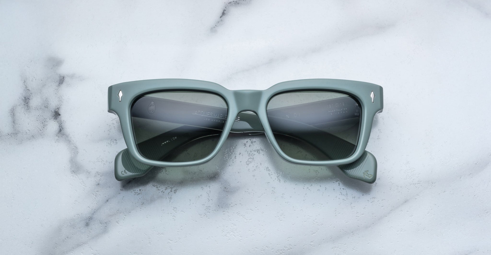 Jacques Marie Mage Molino rectangular green sunglasses with dark lenses, front view, eyewear product.