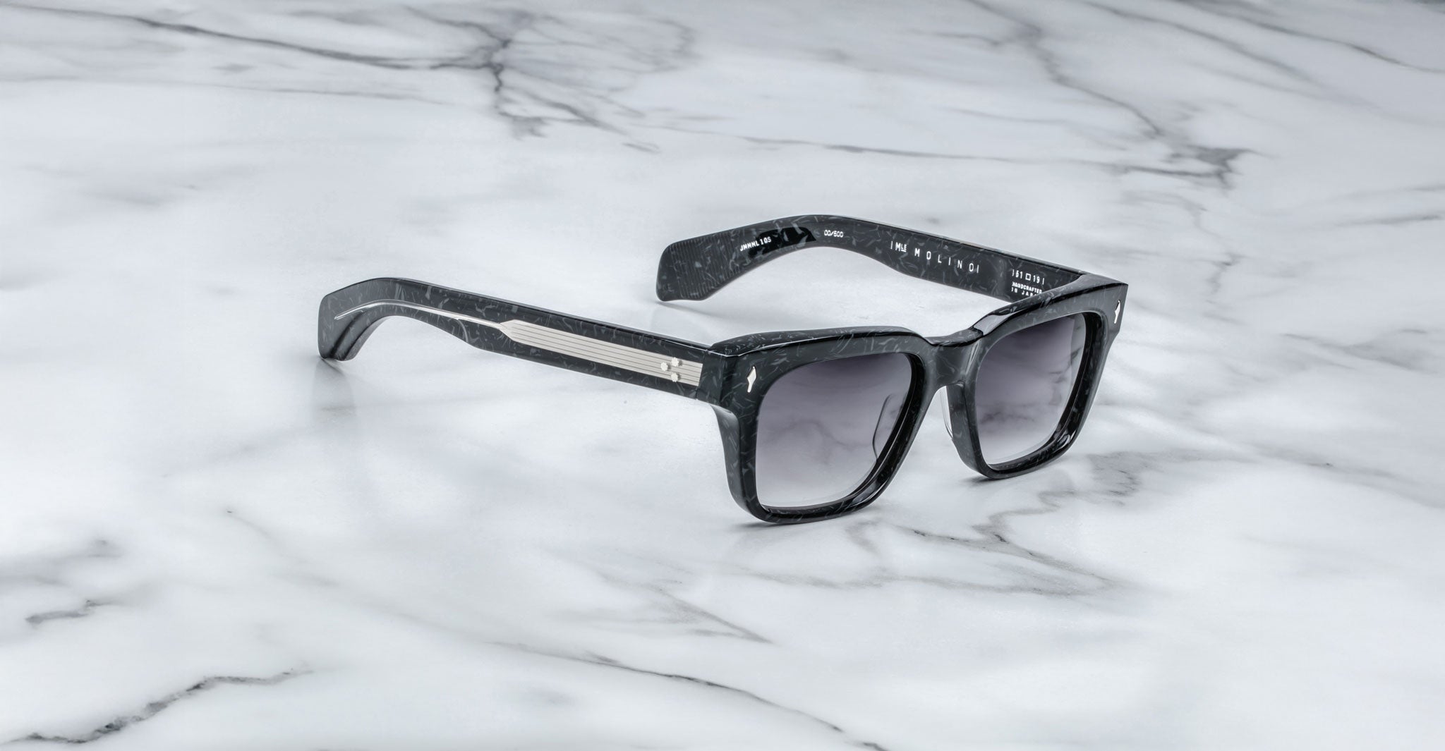 Jacques Marie Mage Molino black square sunglasses with UV-protective dark lenses, front view.
