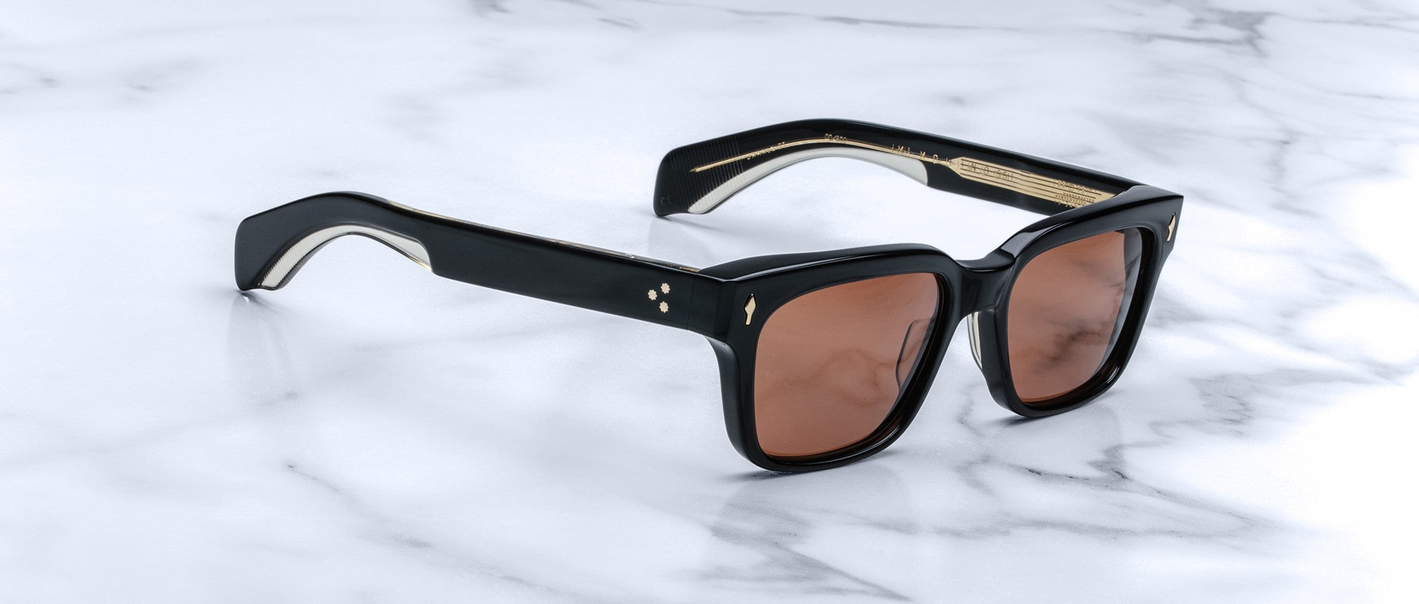 Jacques Marie Mage Molino 55 black rectangular sunglasses with brown lenses, top view.