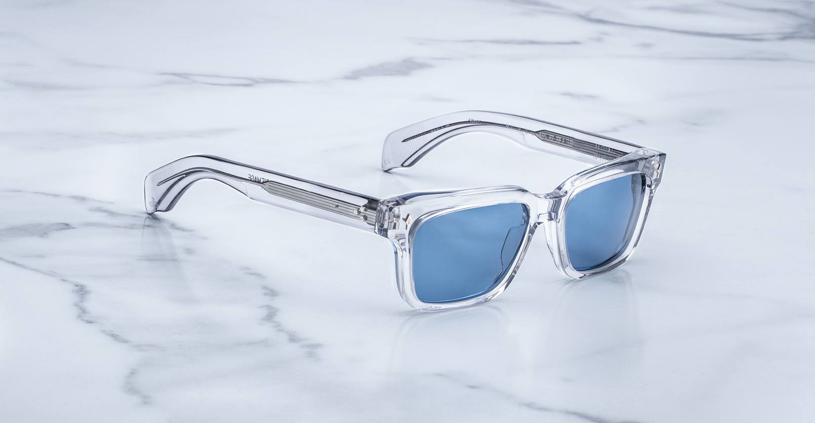 Angled view of the Jacques Marie Mage Molino 55 style sunglasses in colorway Frost