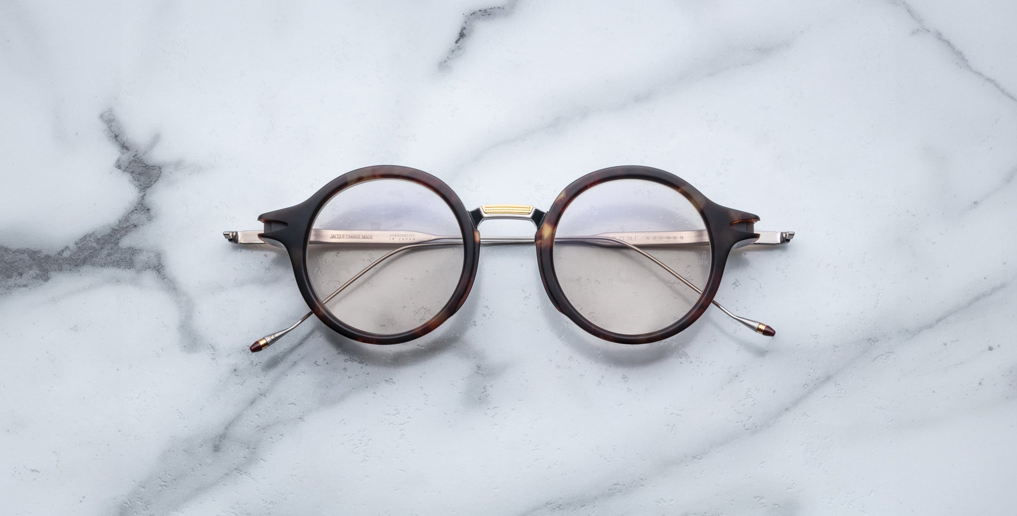 Jacques Marie Mage Norman eyeglasses with clear lenses, front view.