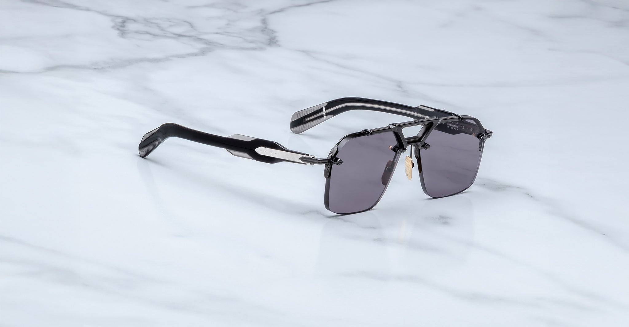Jacques Marie Mage Silverton sunglass in the Raven colorway profile view