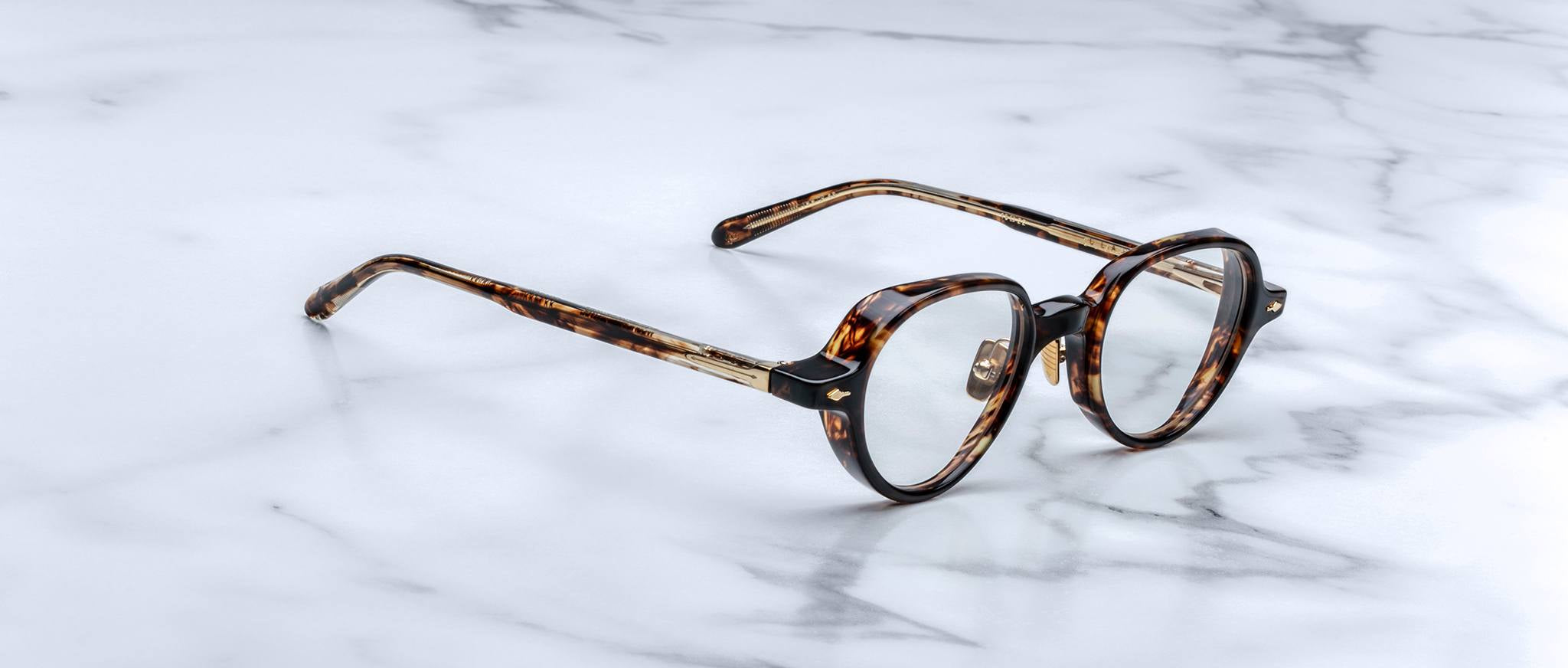 Jacques Marie Mage The Clark round tortoiseshell eyeglasses with clear lenses, top view.