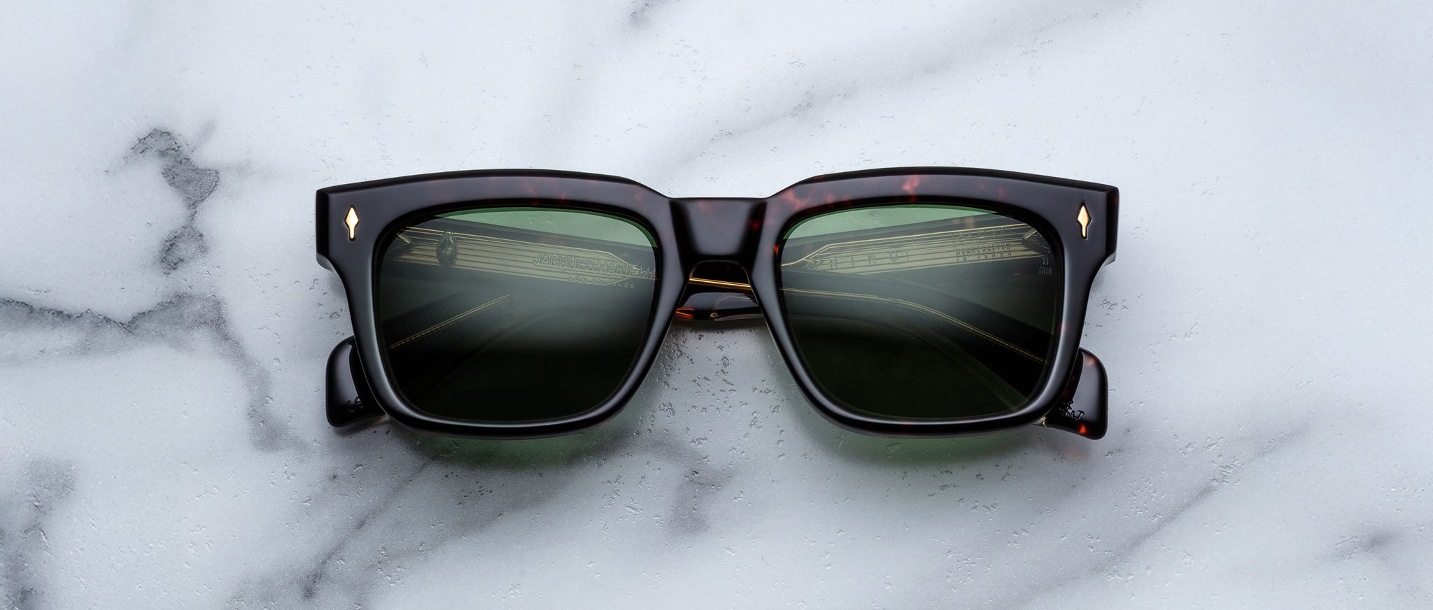 Jacques Marie Mage Torino in Etna square tortoiseshell sunglasses with green lenses, top view.