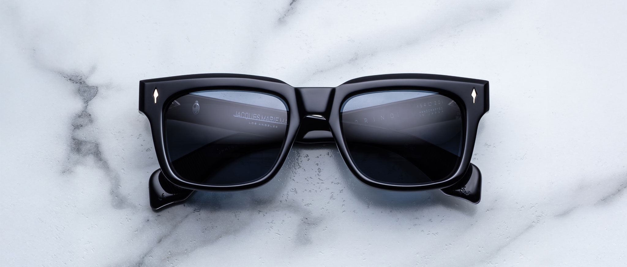 Jacques Marie Mage Torino in Lacquer rectangular dark blue sunglasses with dark lenses, front view.