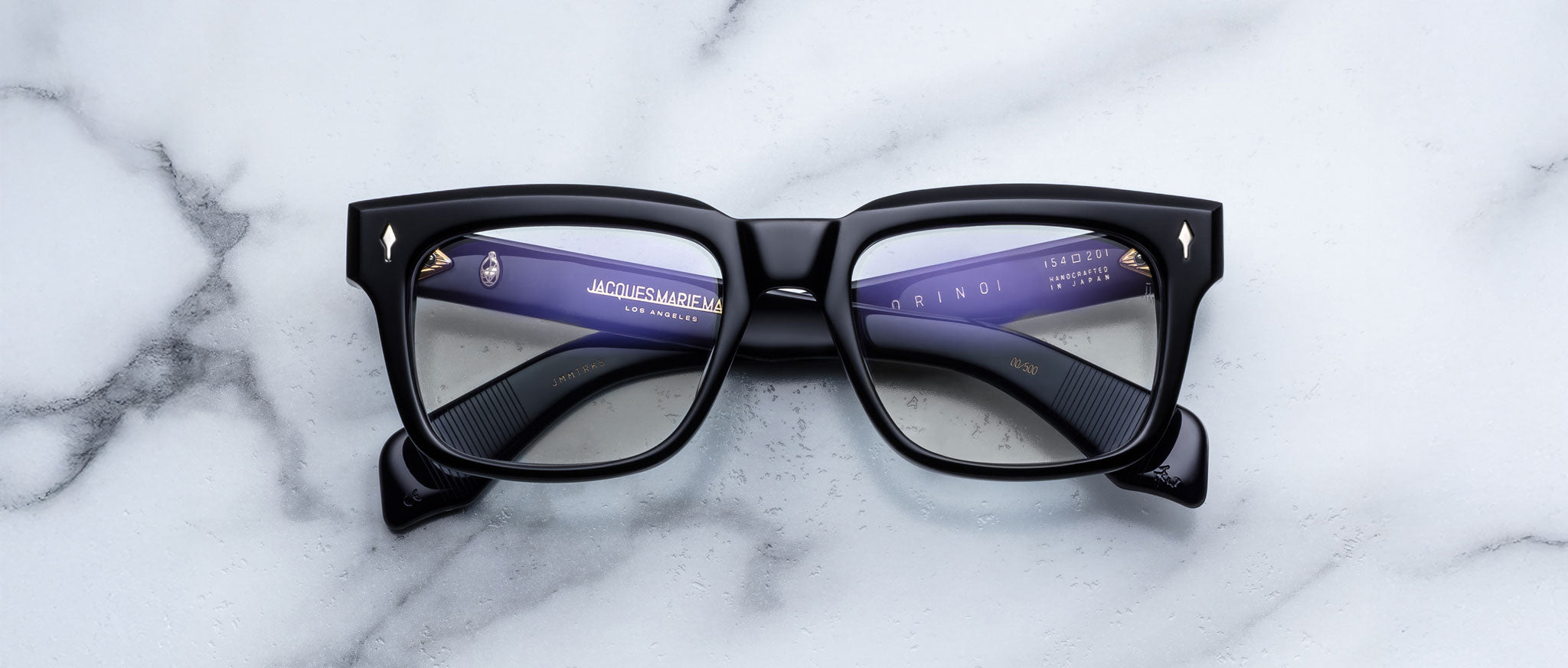 Jacques Marie Mage Torino in Obscure black rectangular eyeglasses with clear lenses, classic full-rim frame, top-down view.