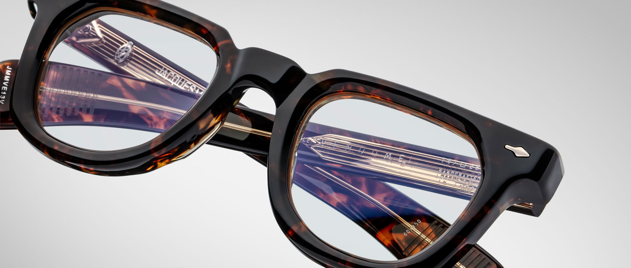 Close-up of Jacques Marie Mage Vendome tortoiseshell eyeglasses with clear lenses, front view.