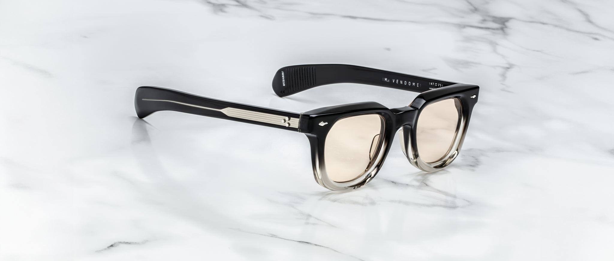 Jacques Marie Mage Vendome sunglasses, black and beige gradient frame with light lenses, front view.
