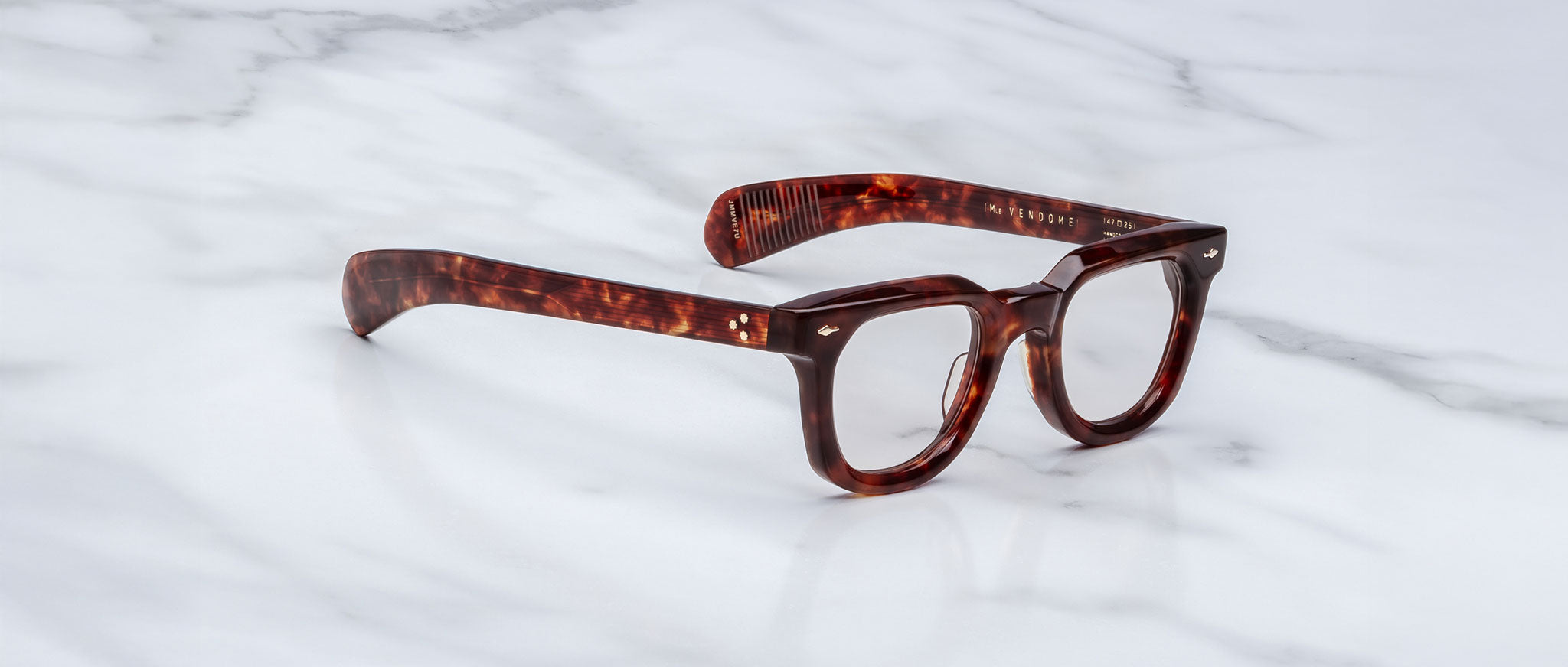 Jacques Marie Mage Vendome eyeglasses with thick brown tortoiseshell frames, front view.