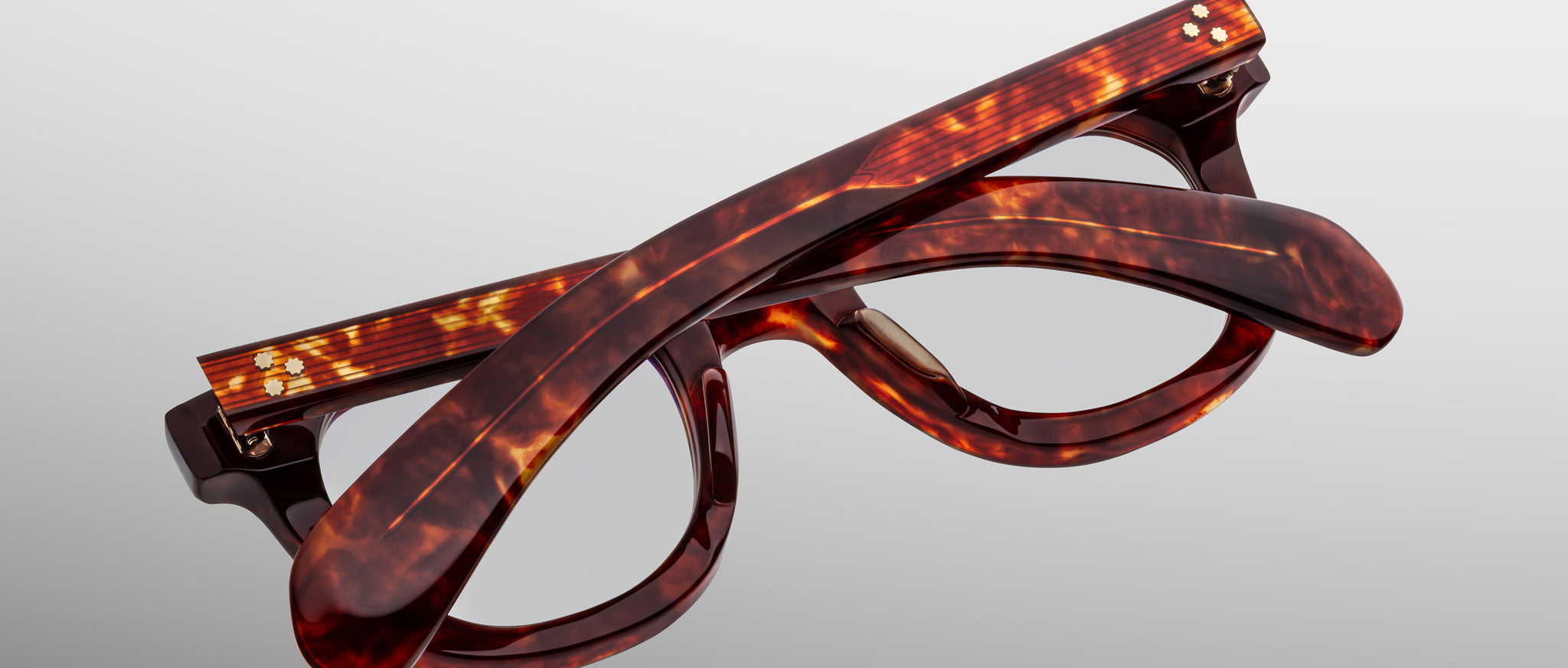 Jacques Marie Mage Vendome tortoiseshell eyeglasses folded, viewed from above, showing full frame and arms.