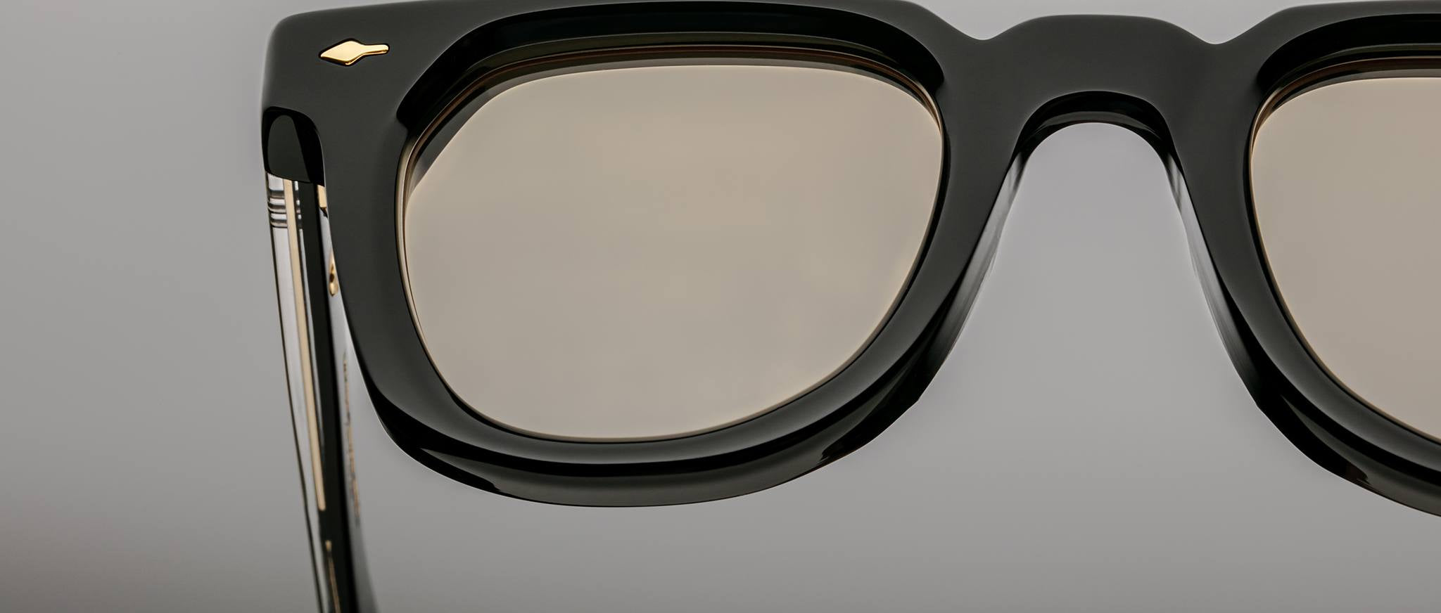 Jacques Marie Mage Vendome black rectangular eyeglasses with light brown lenses, front view.