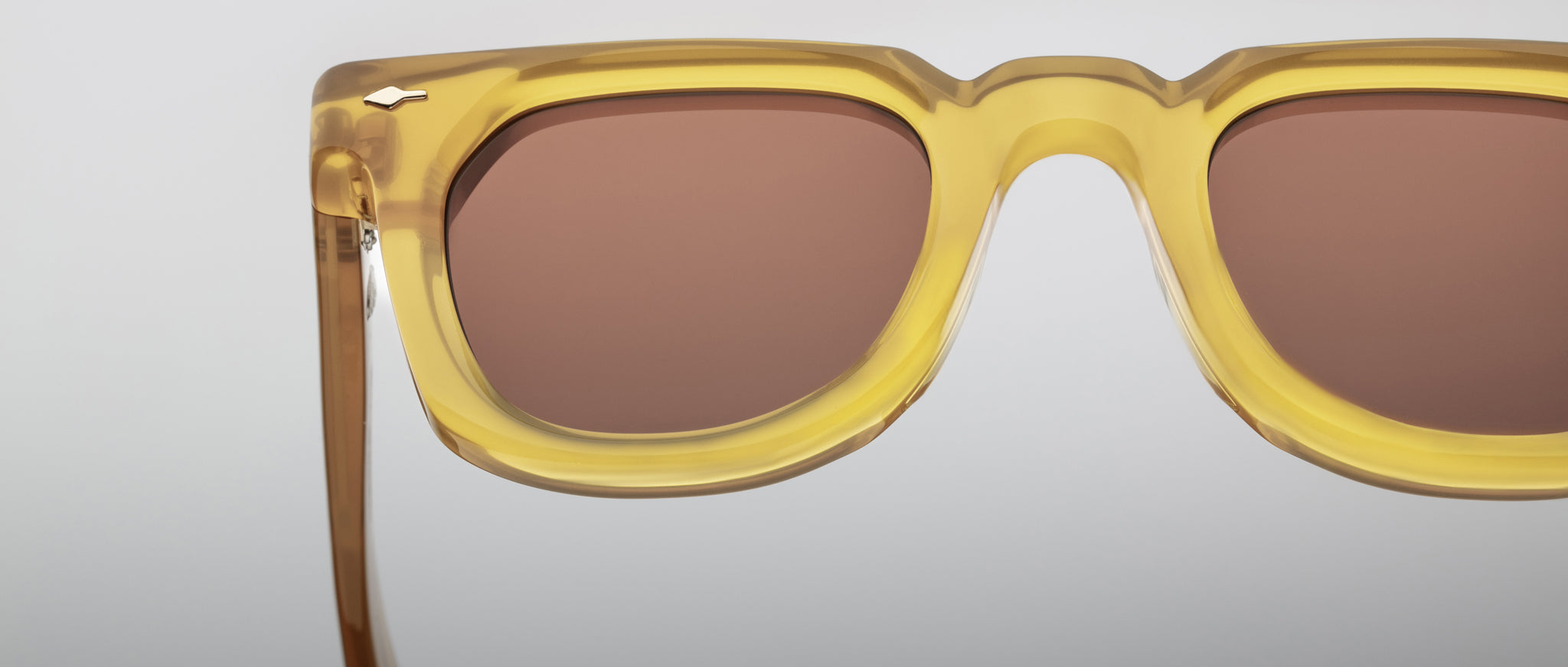 Jacques Marie Mage Vendome yellow translucent sunglasses with brown lenses, front view, minimalist design.