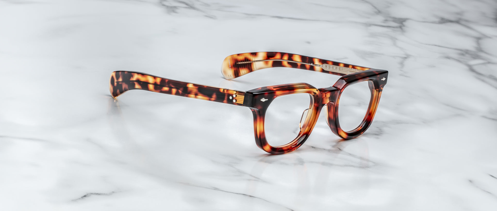 Jacques Marie Mage Vendome eyeglasses with thick frames, shown from above, highlight the brand and models distinctive design.