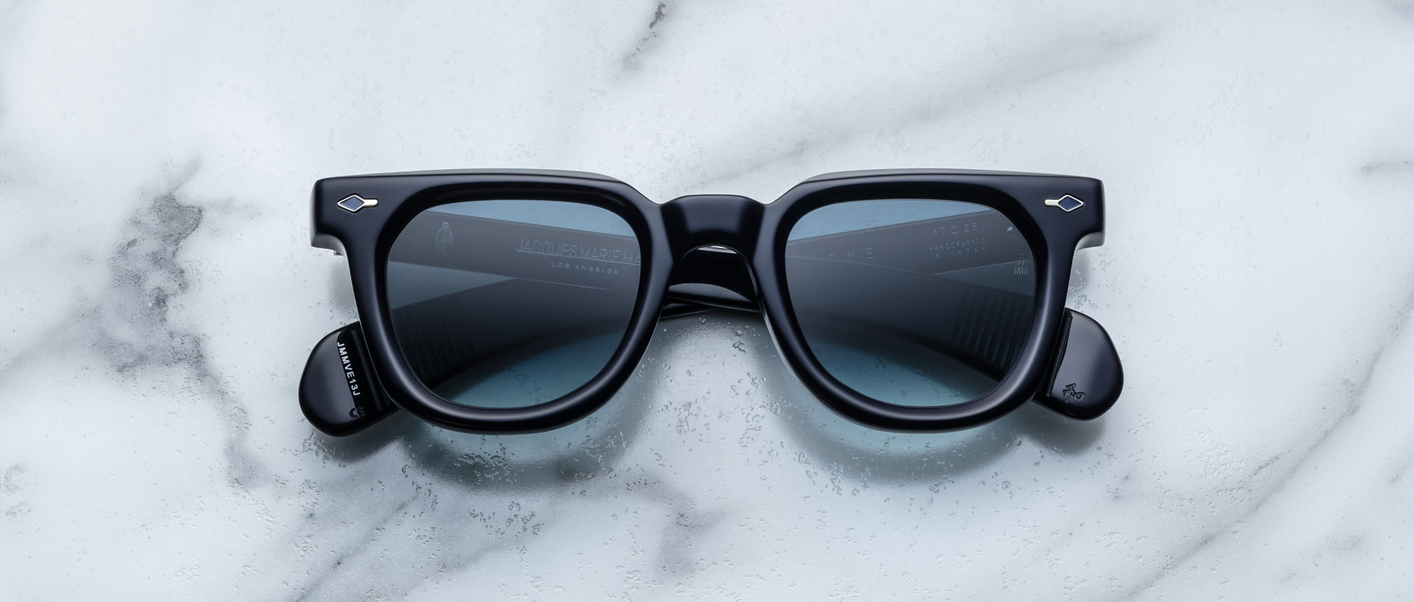 Jacques Marie Mage Vendome sunglasses with thick frames, viewed from above, showing bold design and signature shape.