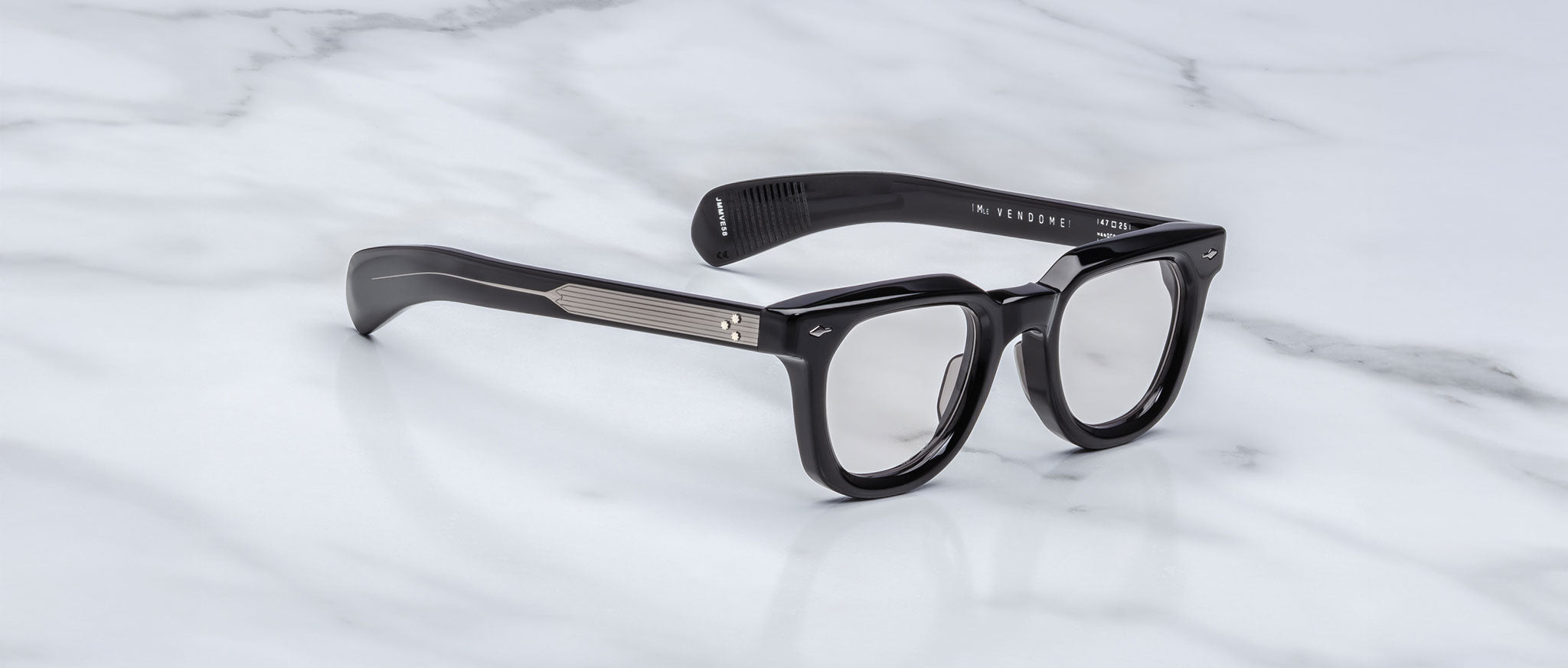 Jacques Marie Mage Vendome eyeglasses, thick black frames with silver accents, top view.