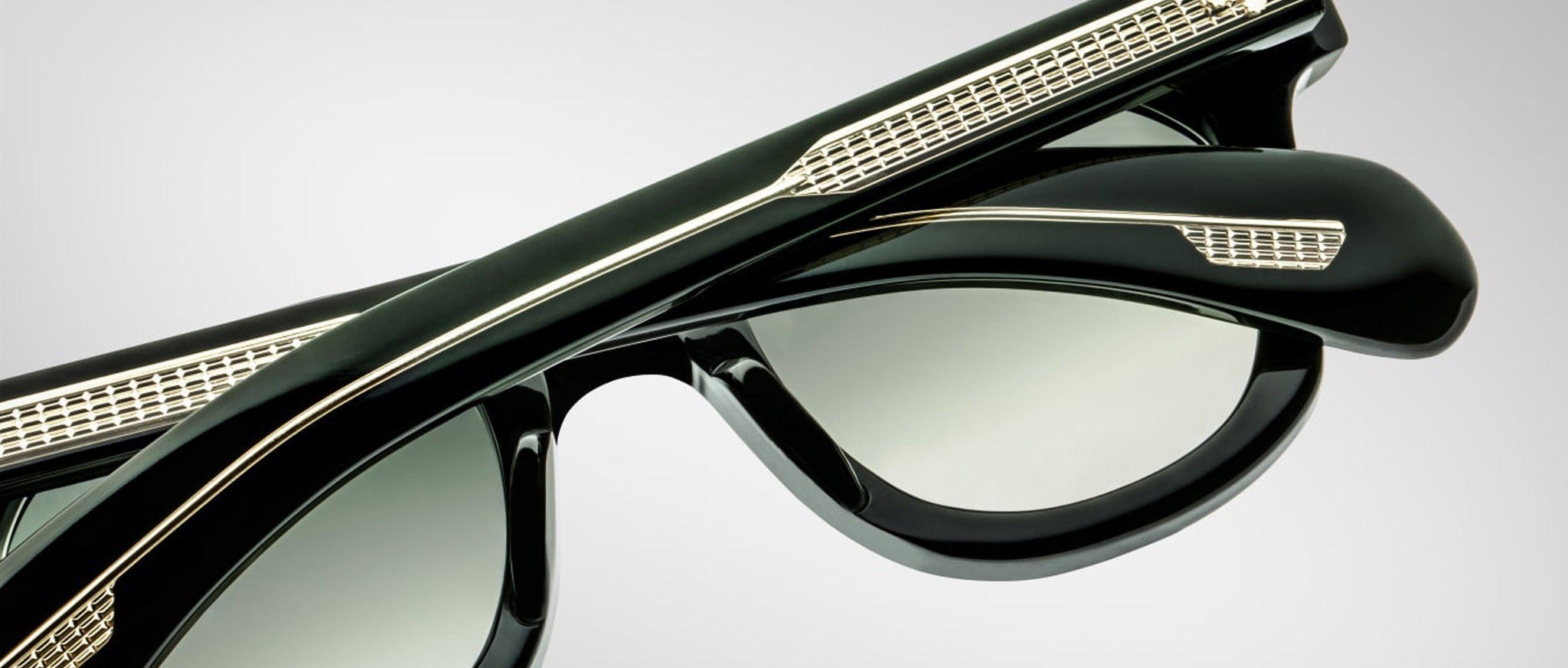 Close-up of Jacques Marie Mage Vendome sunglasses, black frame with metallic accents, UV protection, front angle view.