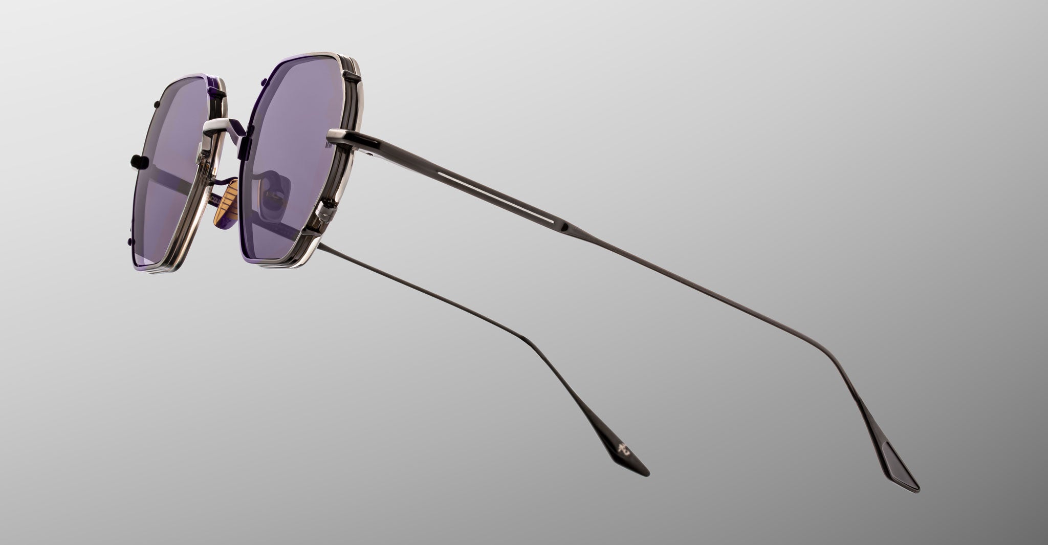 Jacques Marie Mage Verlaine sunglasses with angular frames, UV-protective purple lenses, and thin metal temples, front view.