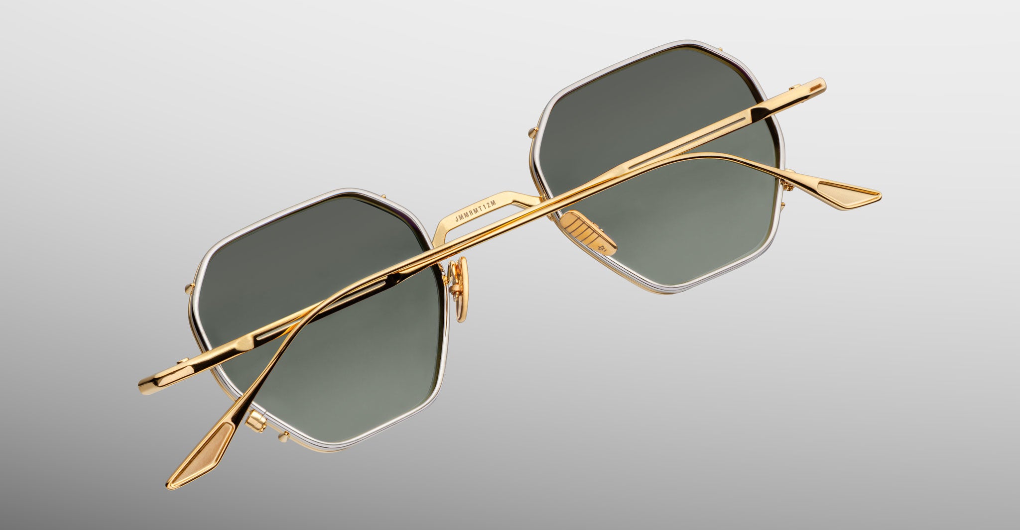 Jacques Marie Mage Verlaine gold geometric sunglasses with dark polarized lenses, rear view.