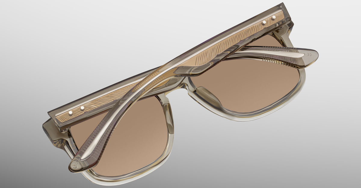 Jacques Marie Mage Wesley sunglasses displayed upside down, focusing on the arms and top from a top-down angle.
