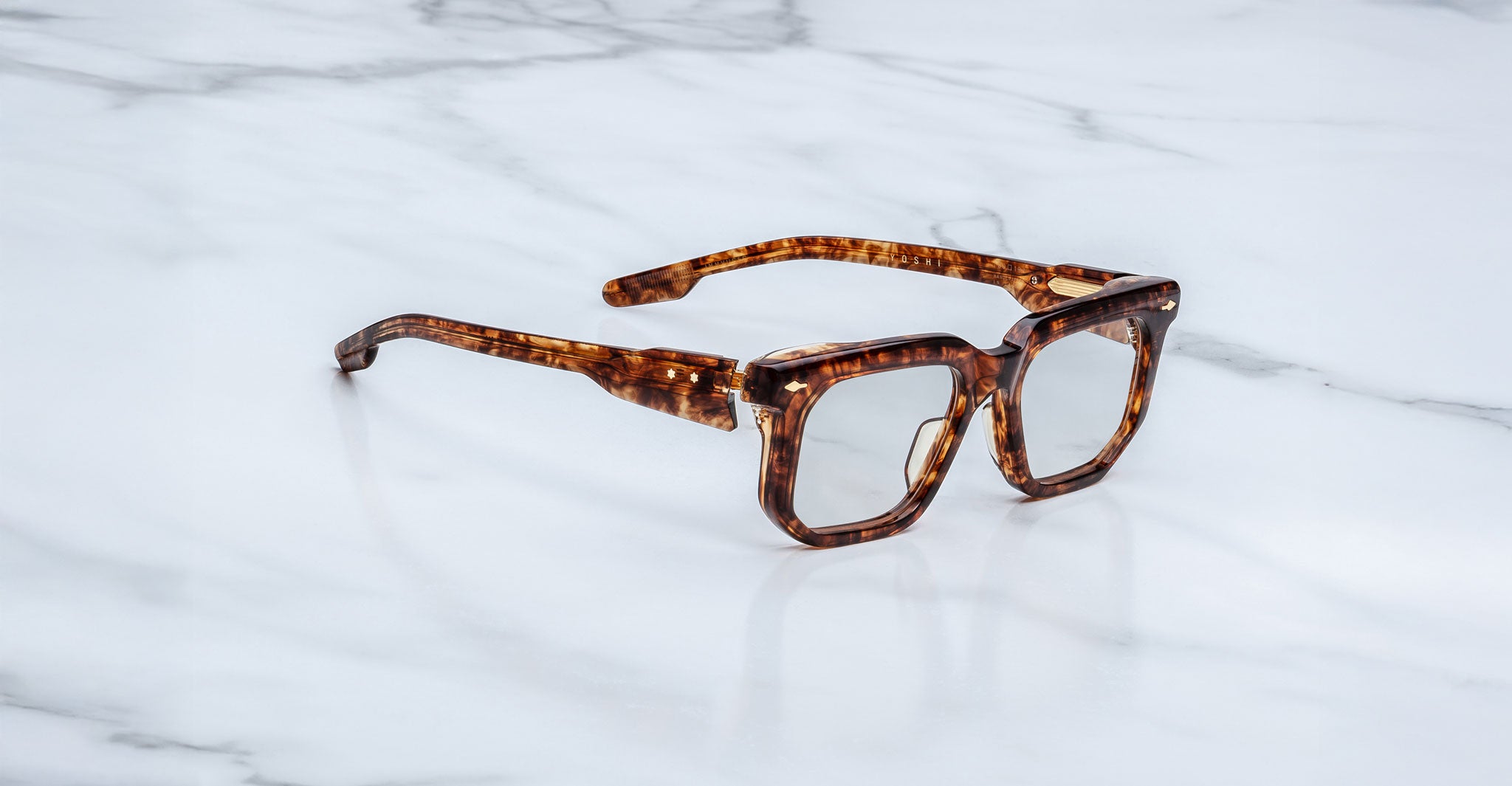 Jacques Marie Mage Yoshi in Argyle optical frame featuring bold geometric lenses and sculpted temples