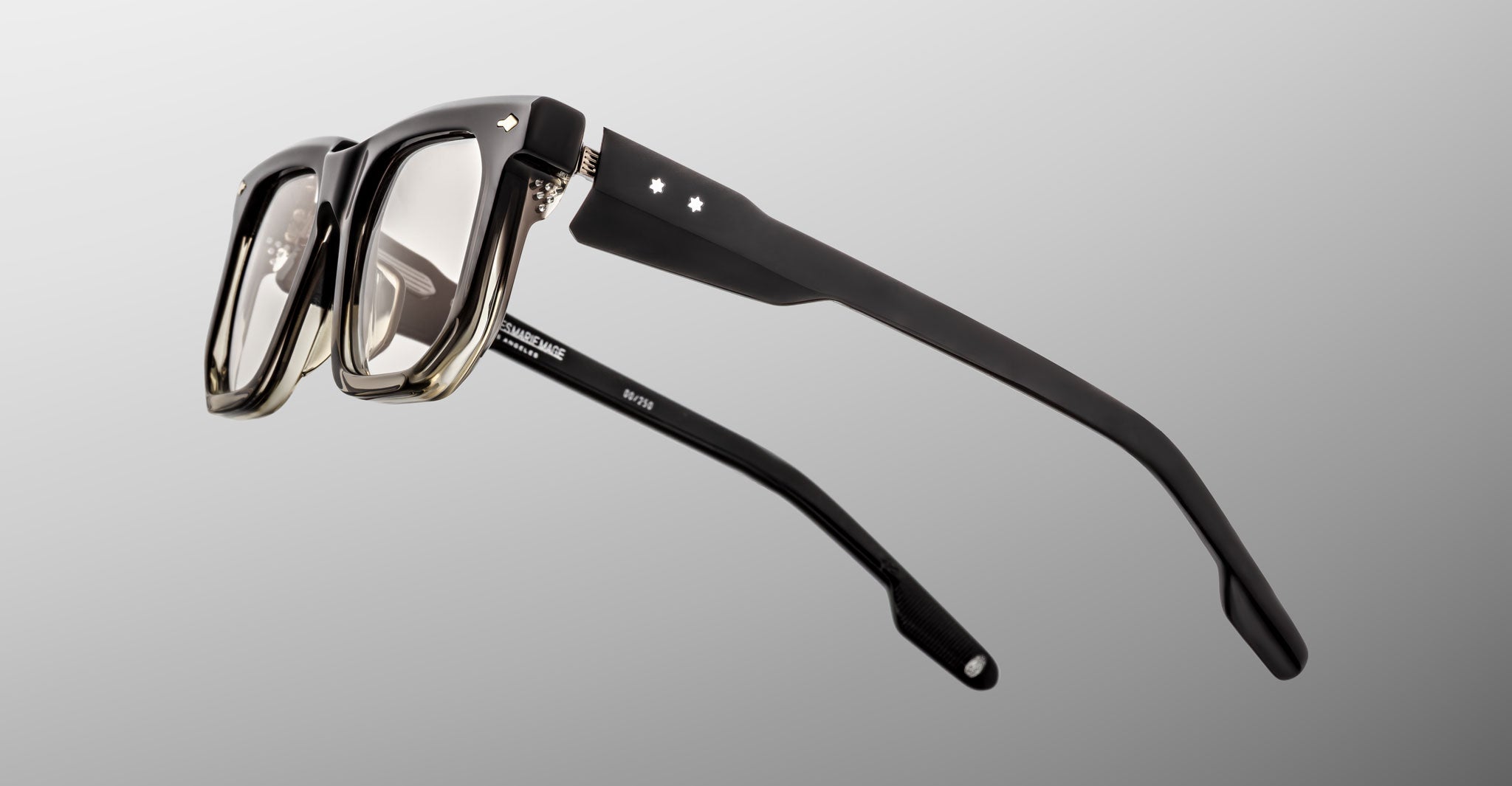 Jacques Marie Mage Yoshi in Black Fade eyeglasses close-up showing temple structure and subtle gradient detailing
