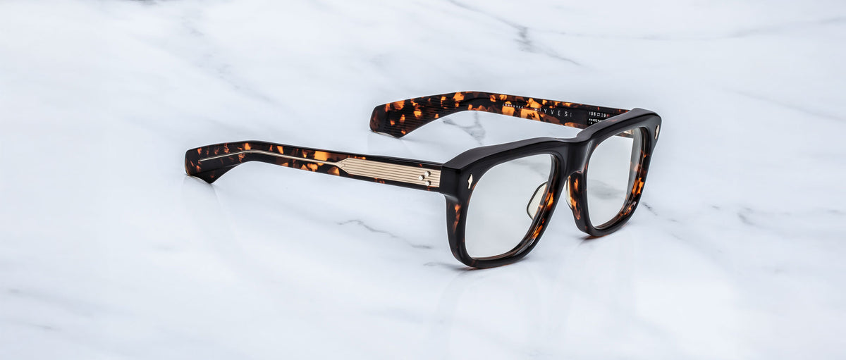 Jacques Marie Mage Yves rectangular tortoiseshell eyeglasses with silver accents, top view.
