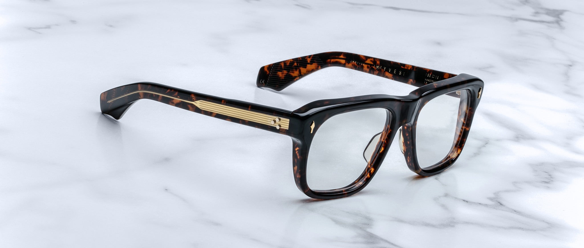 Jacques Marie Mage Yves eyeglasses with gold accents, top view showing round frames and temples.