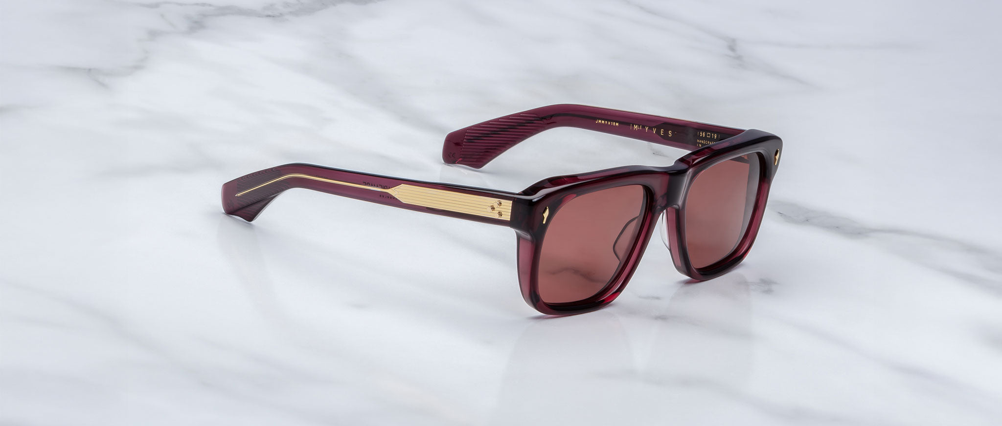 Jacques Marie Mage Yves burgundy square sunglasses with gold-accented arms, front and side view.