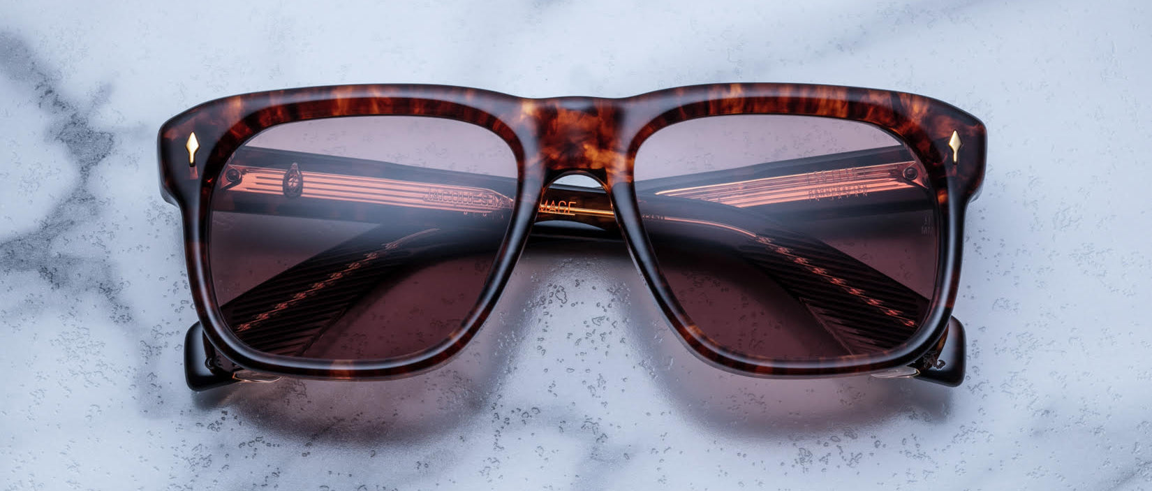 Jacques Marie Mage Yves tortoiseshell square sunglasses with UV-protected tinted lenses, top view.