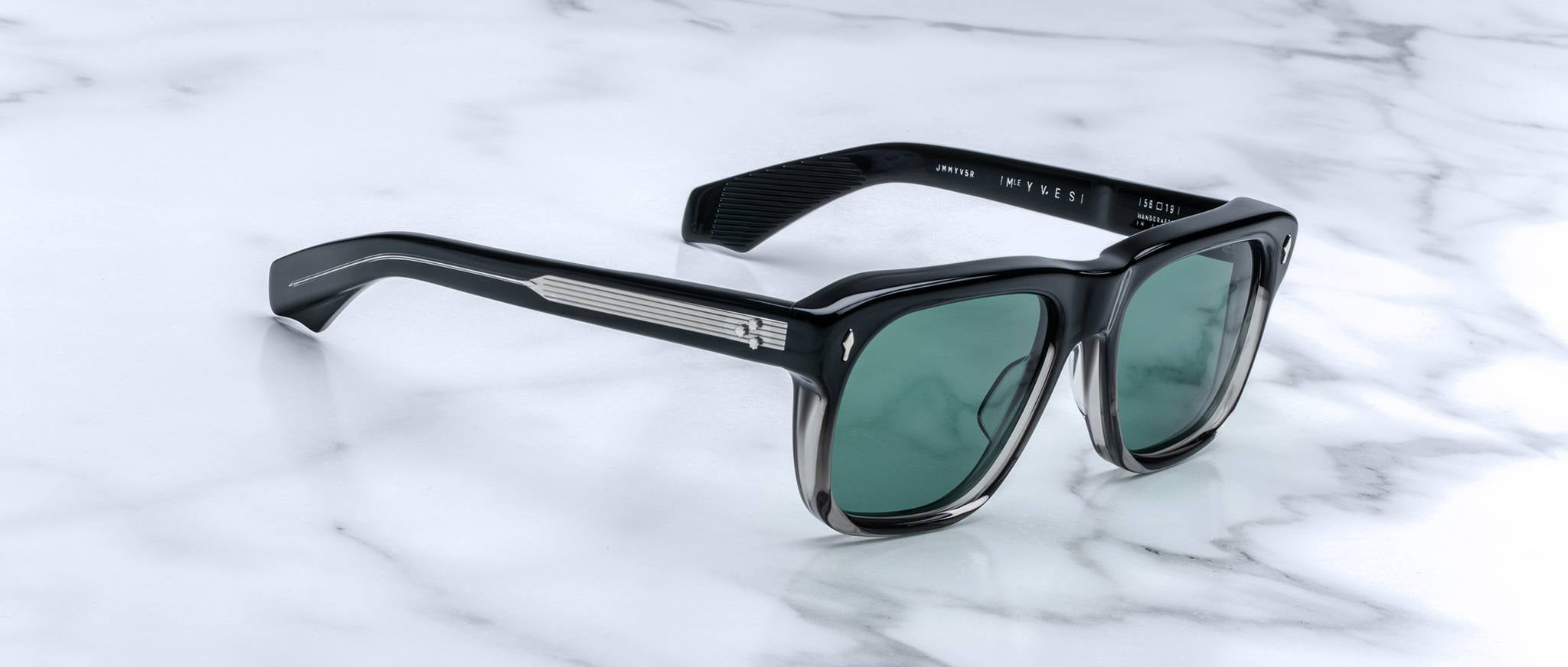 Jacques Marie Mage Yves black rectangular sunglasses with green lenses, front view.