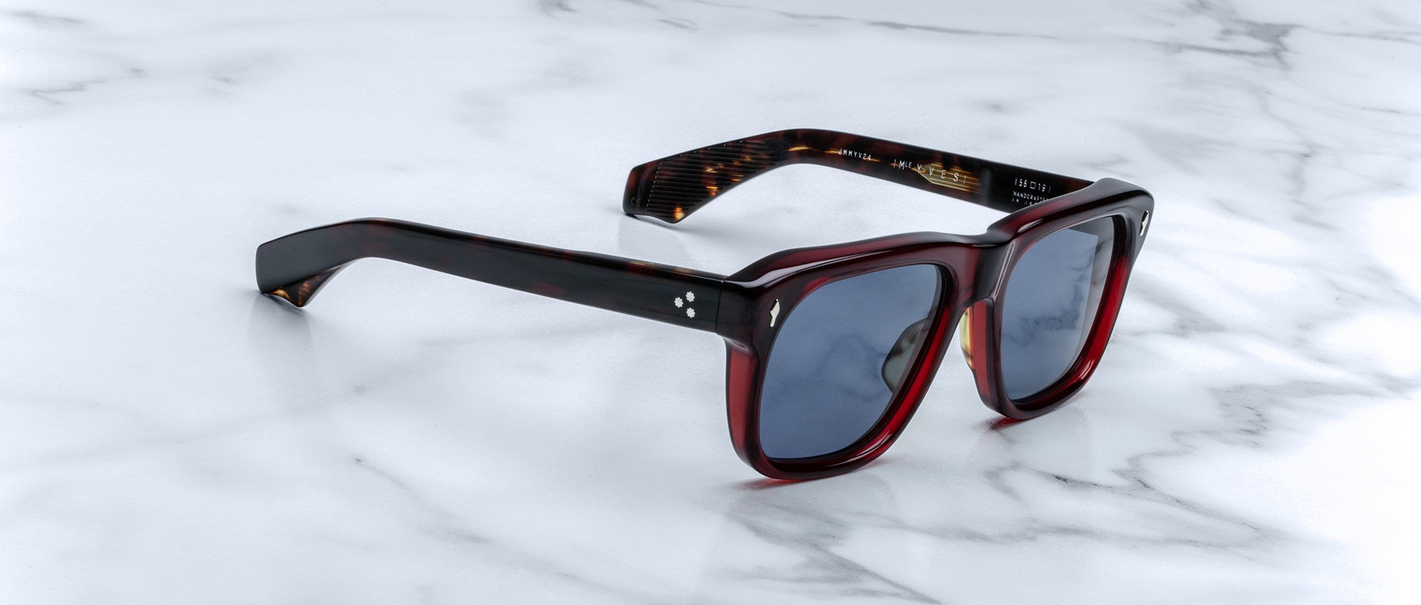 Jacques Marie Mage Yves tortoiseshell sunglasses with dark lenses, profile view, eyewear product photography.