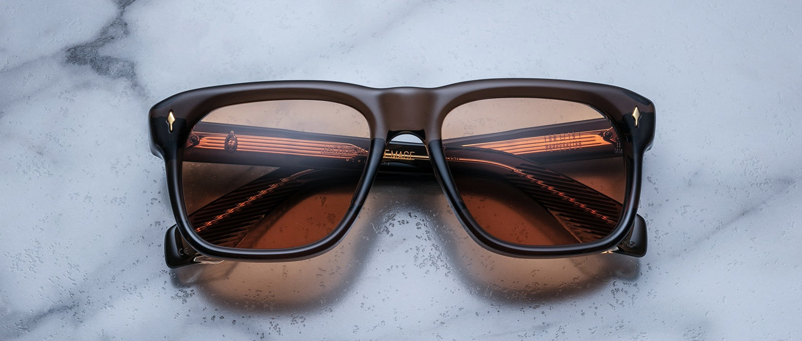 Jacques Marie Mage Yves square brown sunglasses with orange-tinted UV lenses, front view.