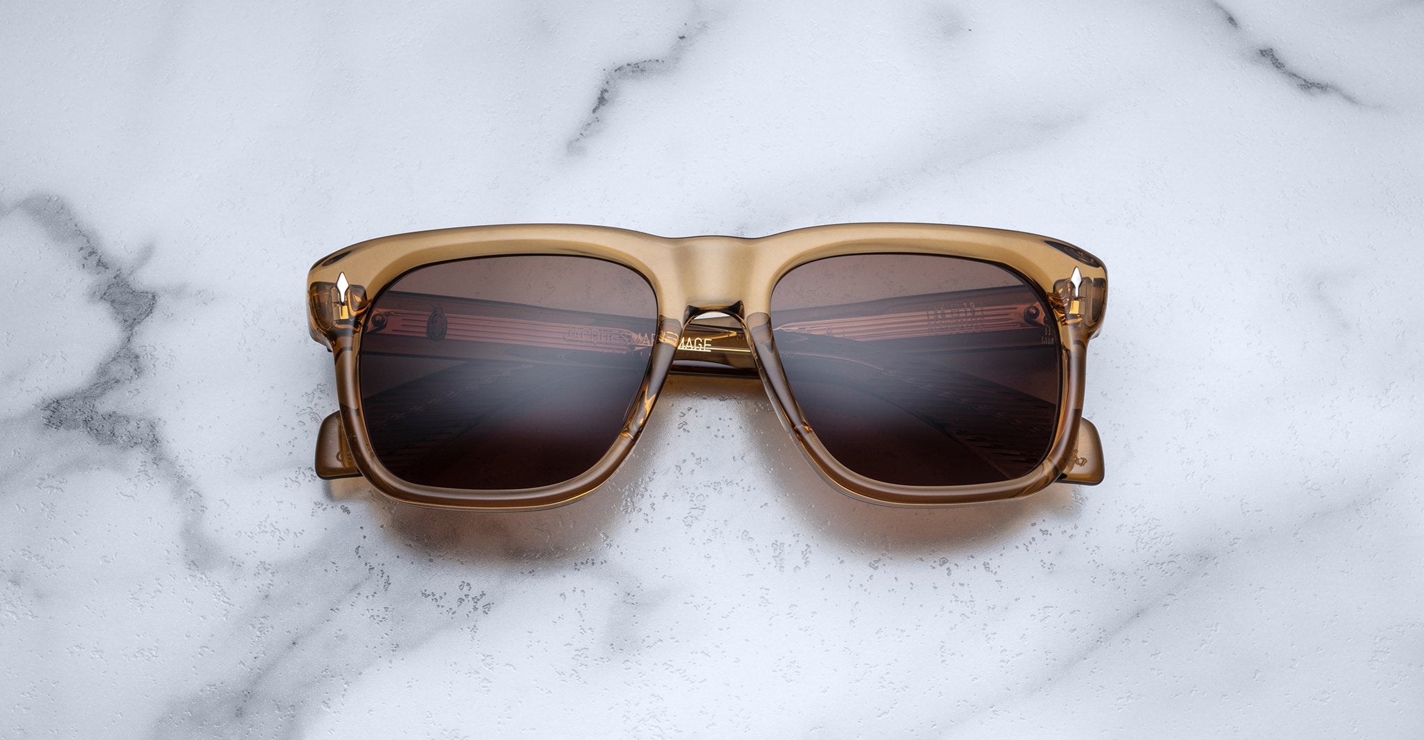 Jacques Marie Mage Yves brown square sunglasses with UV lenses, top view showing frame details.