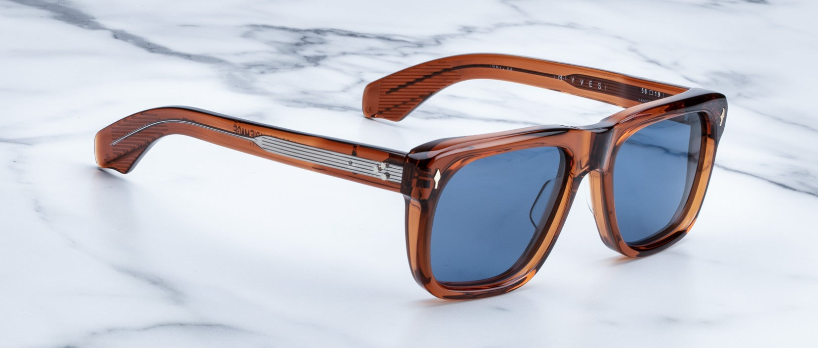 Jacques Marie Mage Yves sunglasses, brown rectangular frame with blue lenses, front view.