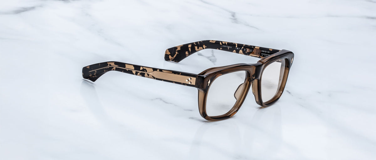 Jacques Marie Mage Yves eyeglasses with thick tortoiseshell frames, front view.