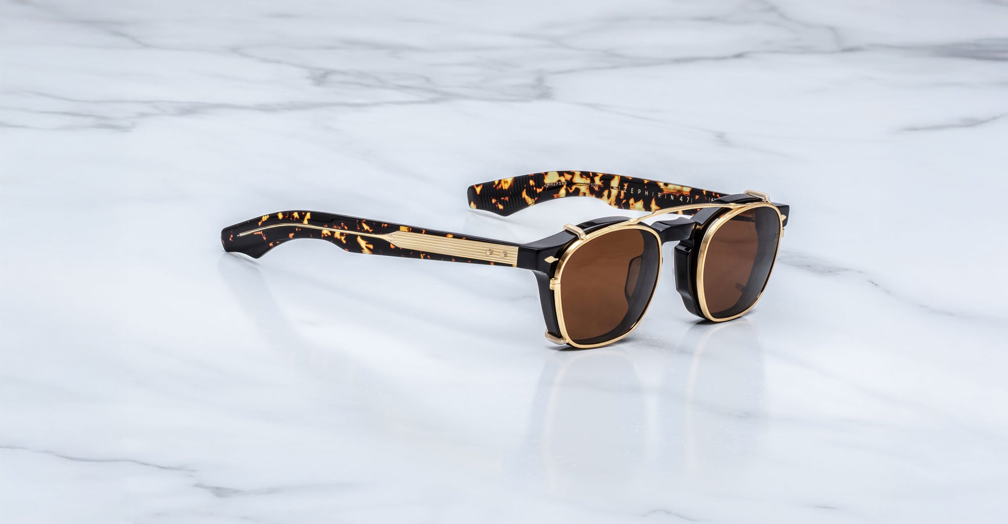 Jacques Marie Mage Zephirin 47 Clip On 2 sunglasses, brown lenses, gold accents, front view.