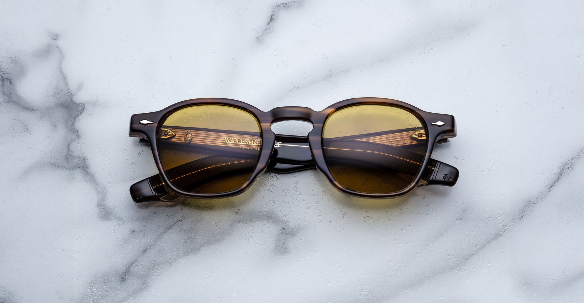 Jacques Marie Mage Zephirin 47 tortoiseshell sunglasses with brown polarized lenses, top view.