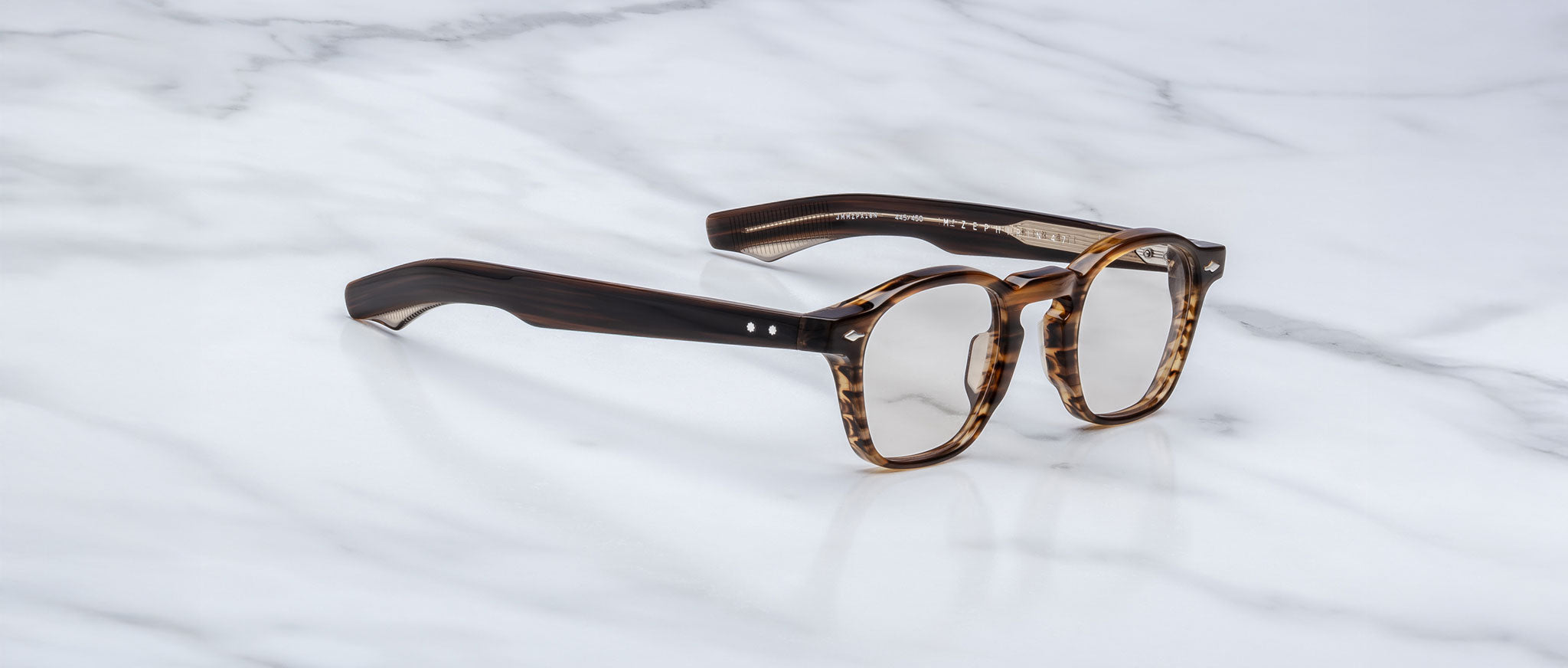 Jacques Marie Mage Zephirin 47 eyeglasses with thick tortoiseshell frames, top view.