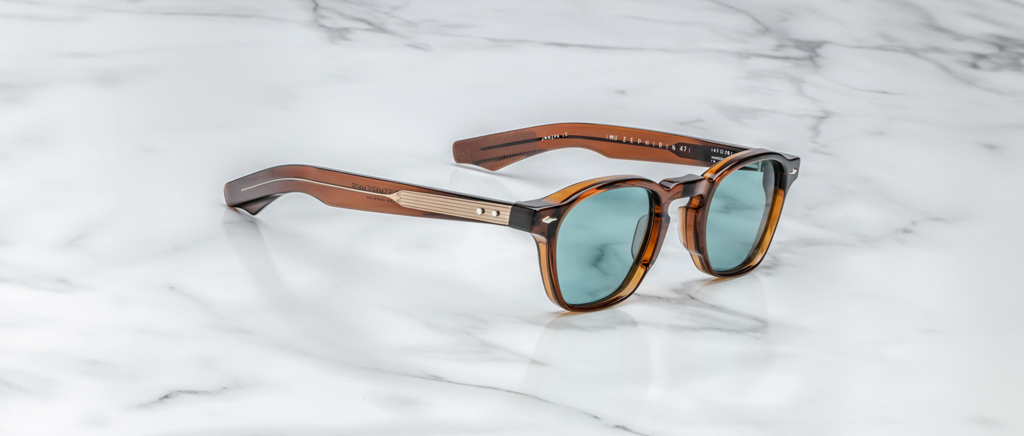 Jacques Marie Mage Zephirin 47 tortoiseshell sunglasses with blue lenses shown from above.
