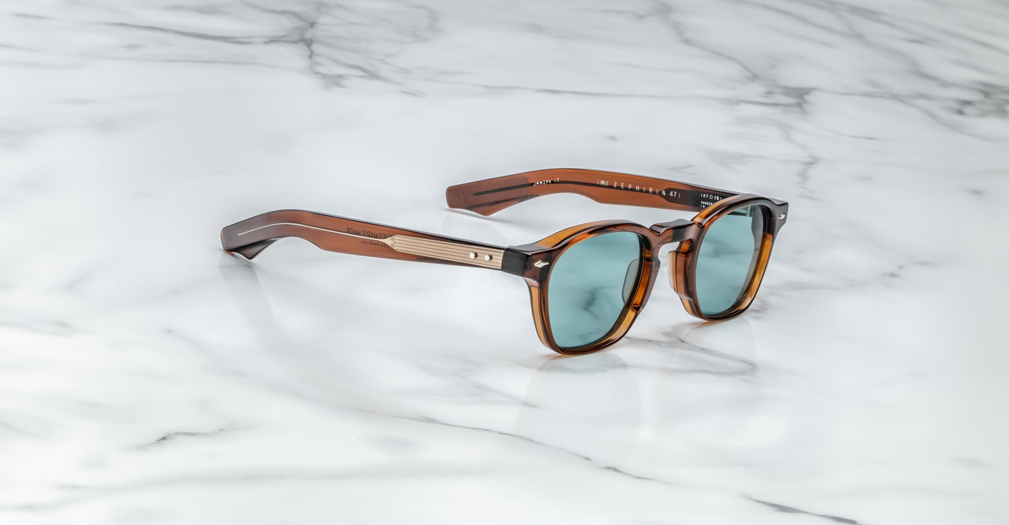 Jacques Marie Mage Zephirin 47 tortoiseshell sunglasses with blue lenses shown from above.